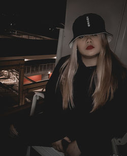 Portrait of woman wearing hat