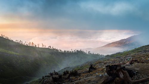 Scenic view of mountains against sky during sunset