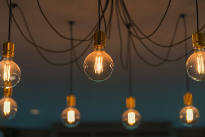 Close-up of illuminated light bulb