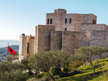 Low angle view of old ruins against clear sky