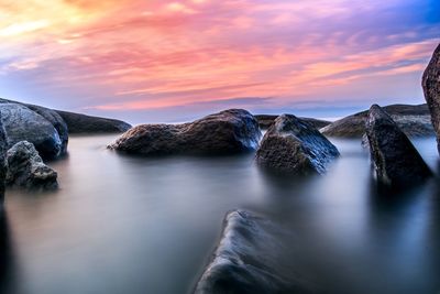 Scenic view of sea against sky during sunset