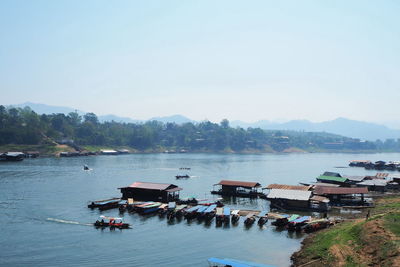 High angle view of boats moored in river against sky