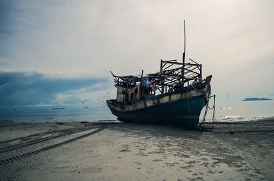 View of shipwreck on beach