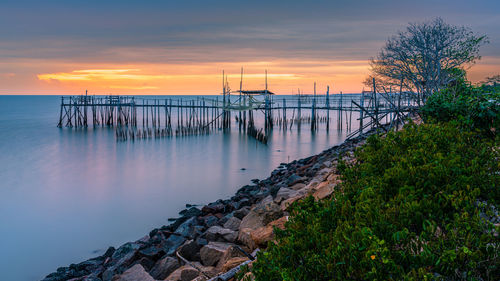 Scenic view of sea against sky during sunset