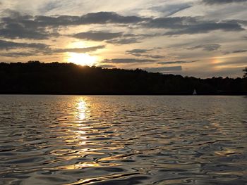 Scenic view of calm sea at sunset