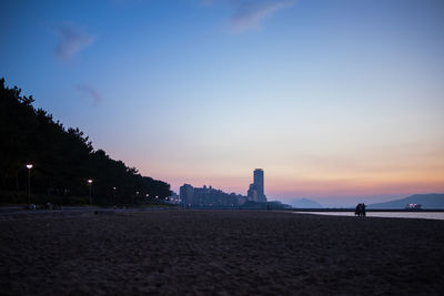 View of beach at sunset