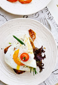 High angle view of breakfast served on table