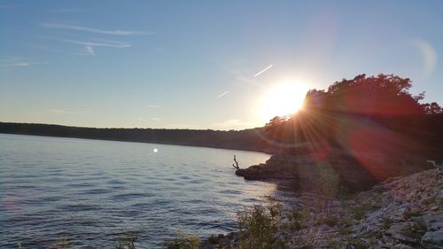 Sun shining over calm sea