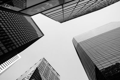 Low angle view of skyscrapers against clear sky