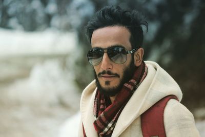 Portrait of young man wearing sunglasses