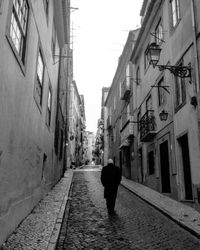 Man walking on street in city