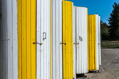 Yellow closed door of building