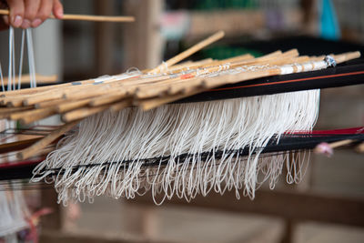 Close-up of person working in factory