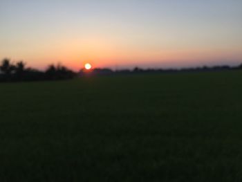 Scenic view of silhouette landscape against sky during sunset