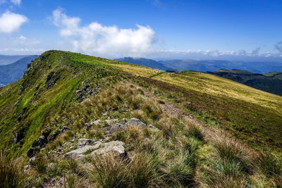 Scenic view of land against sky