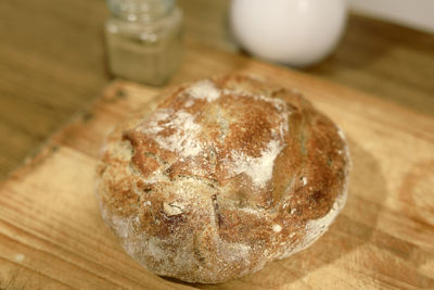 High angle view of bread on cutting board