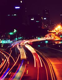 High angle view of light trails on city street