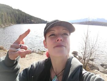Portrait of man in lake during winter