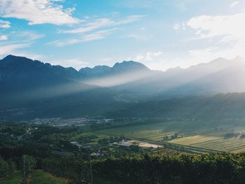 Scenic view of landscape against sky during sunset