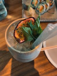 High angle view of drink in glass on table