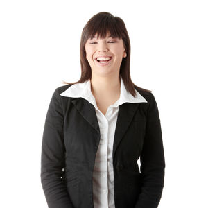 Portrait of a smiling young woman over white background