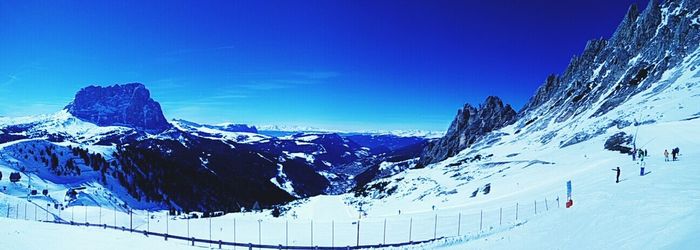 Scenic view of snow covered mountains