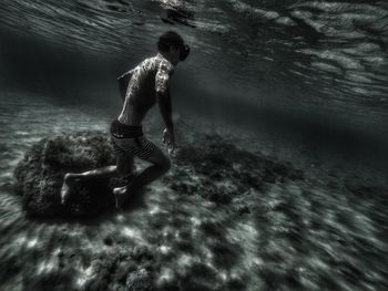 Woman standing in water