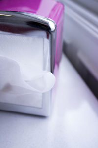 Close-up of tissue paper on table in restaurant