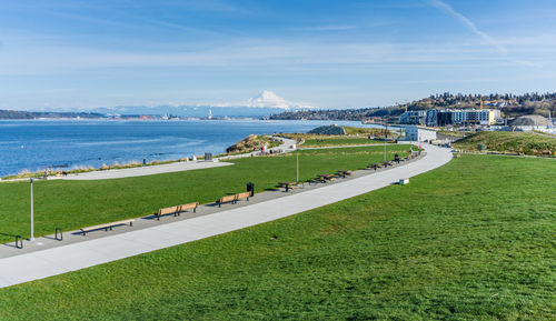 A panoramic view of dune penninsula park with mount rainier in the distance.