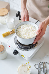 Midsection of man preparing food