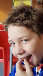 Close-up portrait of smiling boy