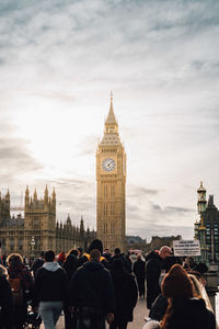 Group of people in city and the big ben 