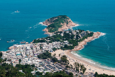 Houses at the coastline of dragon  back, hong kong 