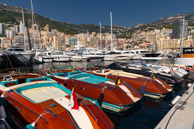 Boats moored at harbor