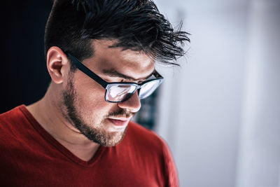 Portrait of young man looking away