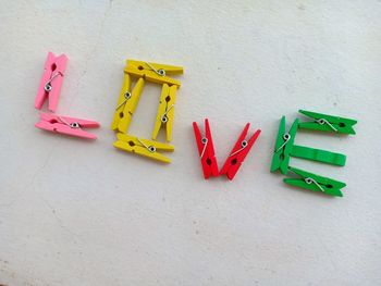 High angle view of toys on table against wall