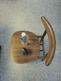 High angle view of empty seat on table