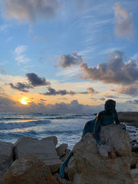 Scenic view of sea against sky during sunset