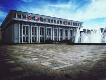 View of building against cloudy sky