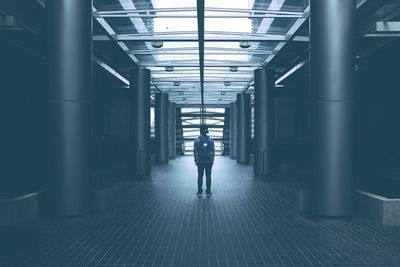 Full length of woman walking in corridor