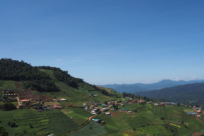 High angle view of field against clear sky