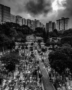 High angle view of buildings and trees in city