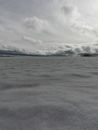 Scenic view of sea against sky during winter