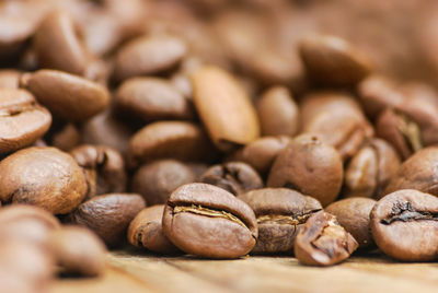 Close-up of coffee beans on table