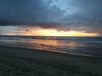 Scenic view of sea against sky during sunset