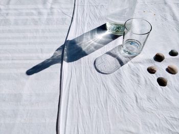 High angle view of drinking glass on table