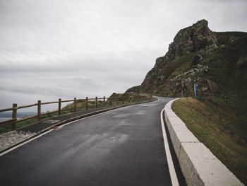 Empty road against sky