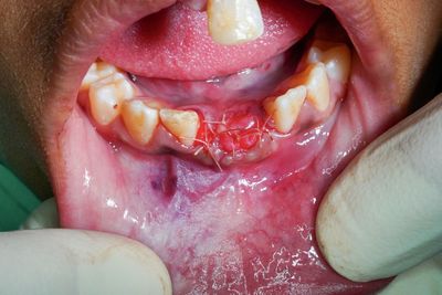 Close-up of hand holding ice cream