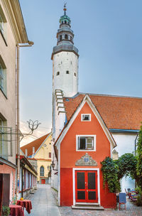 Exterior of buildings in city against sky