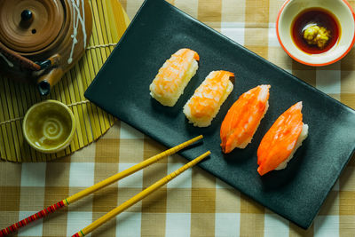 High angle view of sushi served on table